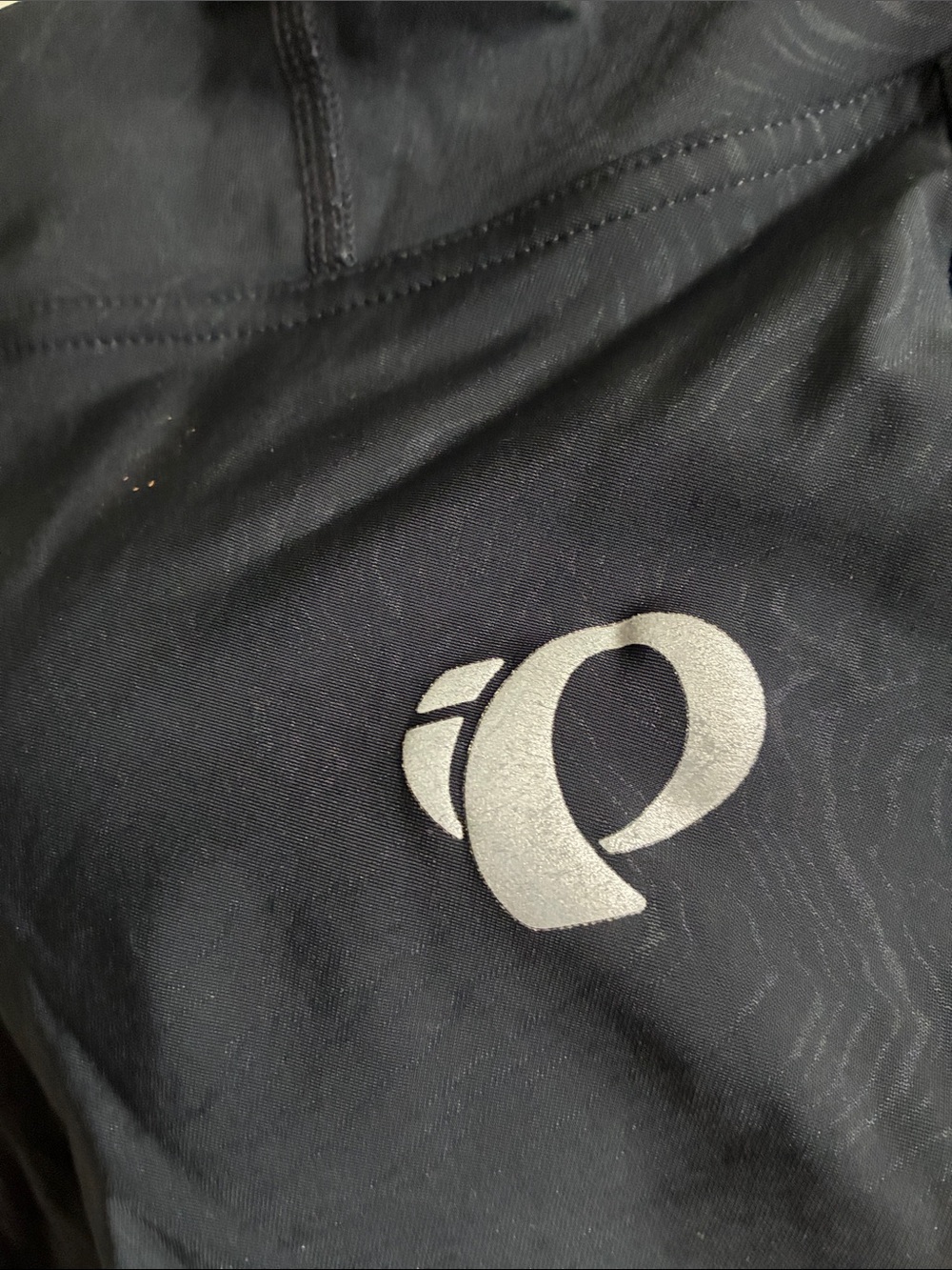Pearl Izumi Black Women's Bike Shorts with Silver Swirl design and ref Logo